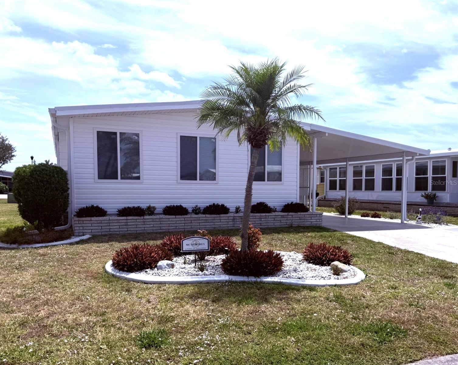 Welcome to this cozy, immaculately maintained 2-bedroom, 2-bathroom manufactured home located in the highly sought-after, pet-friendly, land-owned community of Harbor Isles. This beachy retreat comes fully furnished with coastal turnkey décor and is move-in ready from day one.
Step inside to find luxury vinyl flooring over brand-new subfloors, fresh interior paint, and stylish new lighting throughout. The bright and cheerful kitchen is a delight, featuring new laminate countertops, stainless steel appliances, a huge new kitchen sink, and plenty of space to whip up your favorite meals.
Relax in the brand-new double-insulated Florida room, adorned with charming pine bead board ceilings that add a breezy, coastal flair. Both bathrooms have been beautifully updated, while modern upgrades continue throughout the home with updated windows, a metal roof (with new carport roof added in 2017), a 2020 A/C system with all new ductwork, a 2022 hot water heater, and a 2022 electrical panel.
Nestled in the welcoming waterfront community of Harbor Isles, residents enjoy a vibrant lifestyle with a full calendar of social activities, a heated pool and spa, clubhouse, fitness center, tennis and pickleball courts, shuffleboard, bocce, horseshoes, and a marina with boat slips and a kayak launch leading to the Myakka River and Gulf of Mexico.
Whether you're looking for a full-time residence or a winter getaway, this charming home offers everything you need to live the Florida dream. Call today to schedule your private tour!