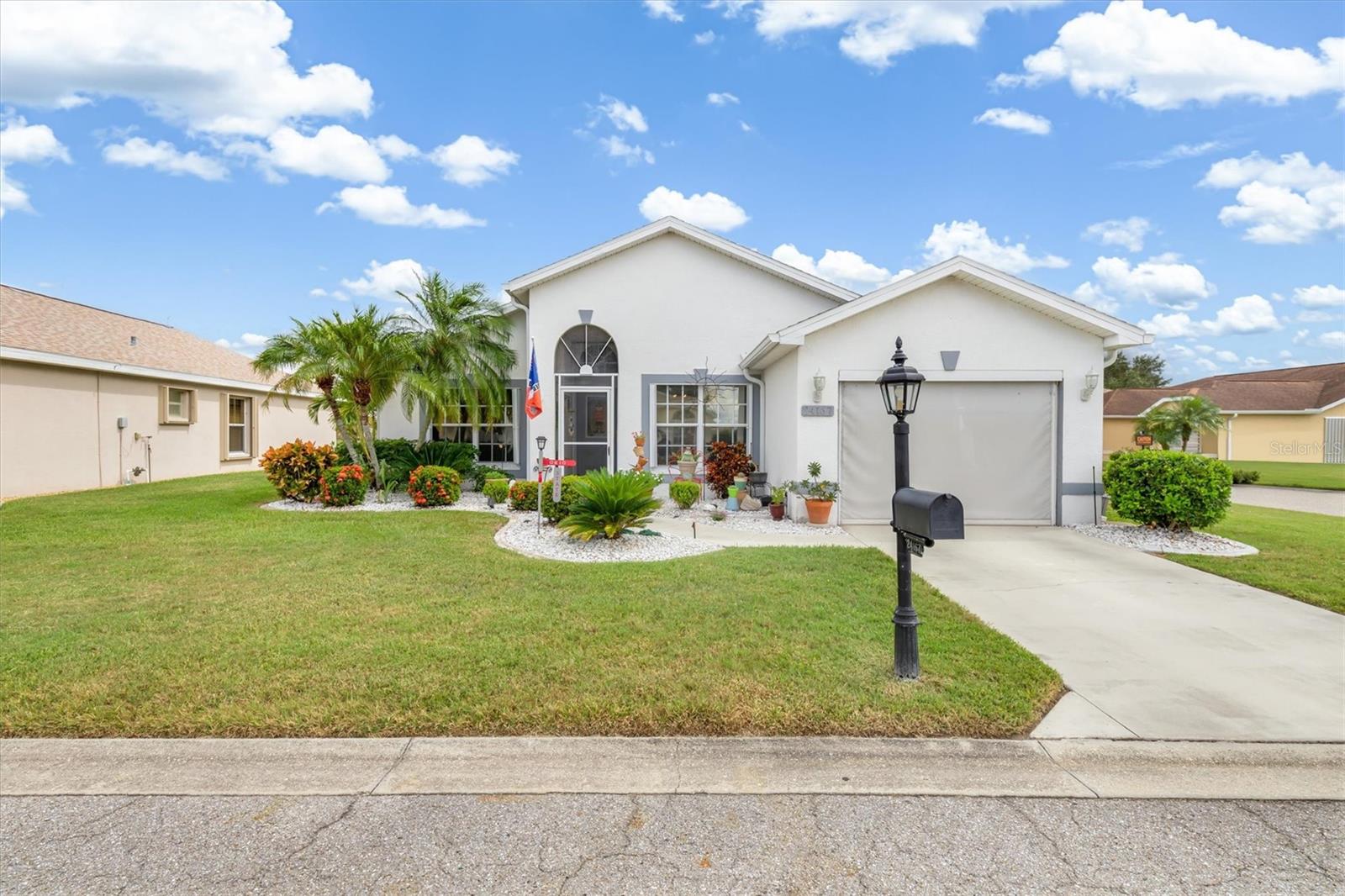 Welcome to Kingsgate, one of the area's premier 55+ gated golf communities, where resort-style living meets everyday comfort. This charming floor plan offers 2 spacious bedrooms, 2 full baths, living room, and a bright and airy Florida room perfect for morning coffee or entertaining guests. Move-in ready – Enjoy peace of mind with a NEWER ROOF (Feb 2022), ACCORDIAN HURRICANE SHUTTERS and new GUTTERS as well as HURRICANE RATED GARAGE DOOR with motorized sun screen and a GENERATOR HOOK UP. The open layout creates a comfortable flow between living spaces, ideal for both quiet evenings and hosting friends. Nestled in the beautifully maintained Kingsgate community, you’ll have access to golf, tennis, a clubhouse with events and activities, heated Olympic size pool & spa, fitness center, tennis courts, pickle ball, lawn bowling, shuffle board, bocce, horseshoes, gym, billiards, library, euchre, bingo, bridge, Texas hold em, poker, mahjong and more — The onsite Lions Den restaurant and bar is convenient and offers Tuesday night Karaoke and monthly trivia contests. Located just a golf cart ride away from the shopping plaza that gives you access to grocery store, drug store, bank, restaurants and shopping. You are also conveniently located to additional restaurants and shops of downtown Punta Gorda and Fisherman's Village as well as airports and beaches. This is a must see! Don’t miss this opportunity to live in one of the area's most sought-after active adult communities. Whether you're a seasonal resident or looking for a year-round retreat, this home checks all the boxes!