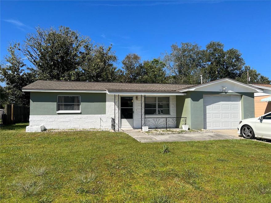 Charming 2 bedroom, 1.5 bath with a 1 car garage home and a screened-in, enclosed porch. New windows and sliding door, a spacious backyard perfect for entertaining, and a cozy, well-maintained interior. Conveniently located close to shopping, dining, and major roads. Cute, cozy, and move-in ready. Don't miss this opportunity!