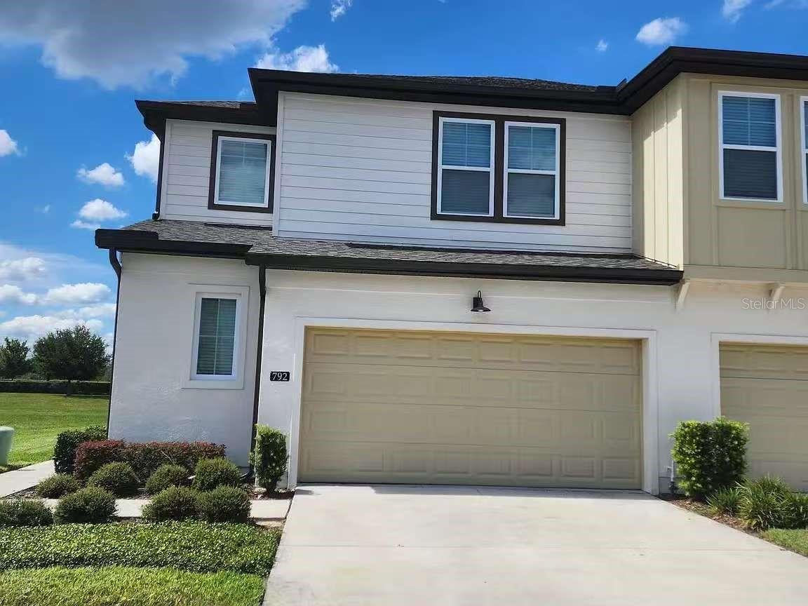 Welcome to The Enclaves at Festival! Gorgeous like new town-homes located in the highly desirable, Champions Gate area. This home is located in a prime location and is an end unit with a pond view. This beautiful 3 bedroom home has a sunny bright, open kitchen with plenty of upgrades such as beautiful 42 inch White cabinets, all stainless steel Whirlpool appliances including gas range, dishwasher, and microwave. Enormous island with Quartz counter perfect for gatherings that is open to the great room and dining area. Main living space on first floor features wood look luxury vinyl plank flooring and bedrooms with upgraded Shaw stain resistant carpet for comfort. Enjoy the resort style amenities with a swim in the beach walk-in community pool, kids' water park, fitness center, 18 hole miniature golf, and beach volleyball court. This home is conveniently located to shopping, grocery stores, Posner Park, Champions Gate Village and Walt Disney World. Call for a showing today!