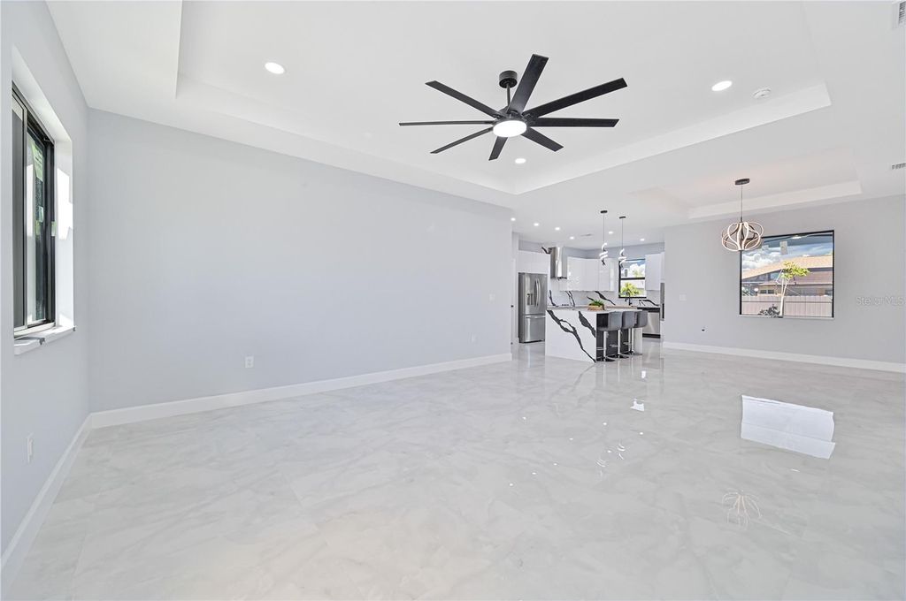 Photo of 313 SE 31st Terrace, Cape Coral, FL 33904 (MLS # TB8442993)