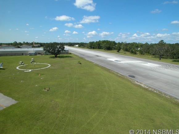 Crosswinds Hangar Condo Spruce Creek - Commercial Sale