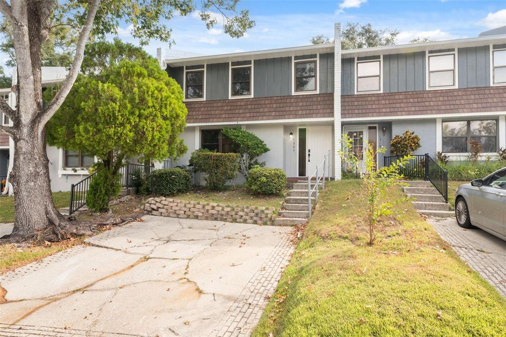 Photo of 1325 Abbey Crescent Lane, Clearwater, FL 33759 (MLS # TB8443413)