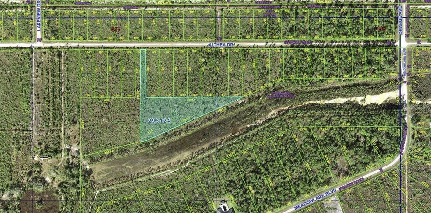 Discover the perfect opportunity to build your dream home on this stunning secluded 3.13-acre lot, tucked away in the vibrant community of Indian Lake Estates! This unique property features an impressive 40x350 ft. entryway from Althea Drive that will lead you into a spectacular expanded triangular-shaped lot. This area is a paradise for golf lovers, fishing enthusiasts, and boating aficionados, all nestled in the beautiful heart of Florida. Indian Lake Estates is about 20 miles east of Lake Wales, encircling the renowned 7,500-acre Lake Walk In Water, famous for its exceptional fishing and hailed as one of Florida's top bass fishing spots. The lake features a beach, a boat ramp, a marina, and boasts the longest freshwater fishing pier in the state. At the pier's front, you'll discover a pavilion equipped with propane grills and covered picnic tables, perfect for gatherings. The community amenities are extensive, including an 18-hole golf course, basketball and tennis courts, a spacious 23,000 sq. ft. clubhouse, a cafe, post office, churches, a library, fitness room, and pro shop. If you cherish nature and the tranquility of country living, you’re in for a treat. The area is teeming with wildlife; keep an eye out for deer, raccoons, turkeys, turtles, cranes, and a variety of birds that call this community home. Orlando and Disney are just an hour’s drive north, while Tampa, Busch Gardens, and the pristine beaches of the Gulf are a bit over an hour to the west. You’ll also find the historic Bok Tower, a National Landmark, in nearby Lake Wales. And just six miles away, the Westgate River Ranch Resort and Rodeo offers a taste of authentic Florida with a full-service resort experience, spanning 1,700 acres. Here, you can enjoy horseback riding, wildlife airboat and swamp buggy rides, a championship rodeo on Saturday nights, a trap/skeet range, nature hikes, a petting farm, a marina, and an Adventure Park with zip lines and rock climbing walls. Dining options include the Westgate Smokehouse Grill and River Ranch Saloon, along with a fantastic selection of cowboy-themed accommodations, from lodge rooms and deluxe suites to spacious cottages and deluxe teepees. Come experience the charm of Indian Lake Estates—Polk County’s best-kept secret!
