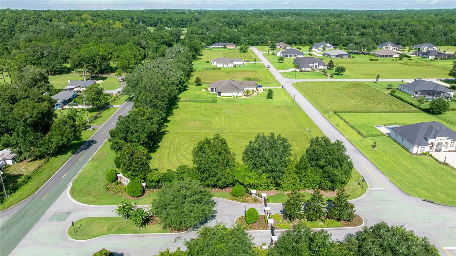 BEAUTIFUL .81 ACRE LOT IN THE GATED COMMUNITY OF LEGENDARY TRAILS. THIS IS AN HOA COMMUNITY THAT SITS OFF OF THE SCENIC SE 80TH ST AND IS IN A DESIRABLE SE LOCATION IN OCALA. CLOSE TO THE SANTOS TRAIL AND COUNTRY CLUB, THIS VACANT LOT IS READY FOR YOU TO BUILD YOUR DREAM HOME. MINIMUM HOME SIZE IS 2700 SQ FT UNDER AIR.