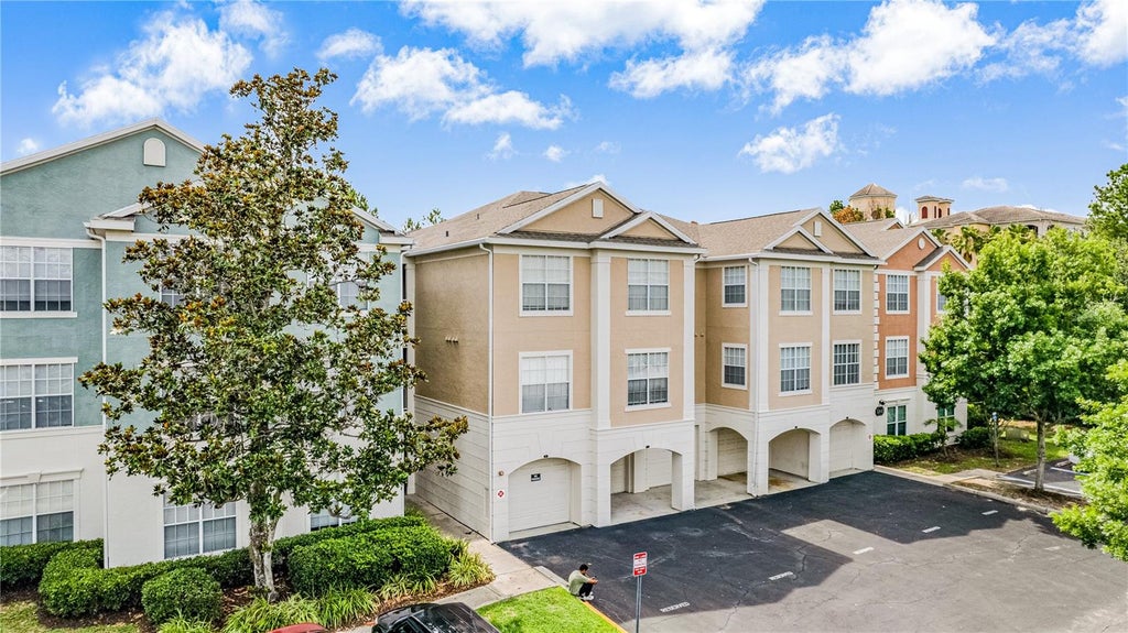 Photo of 12837 Madison Pointe Circle #204, Orlando, FL 32821 (MLS # O6451206)