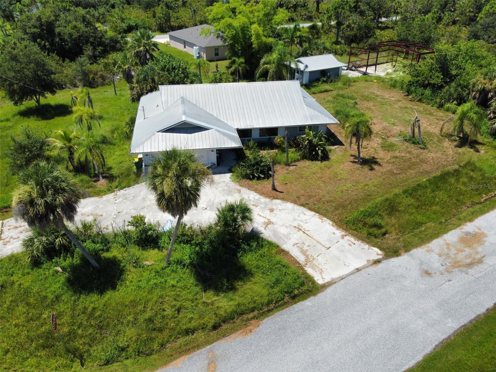 Auction Property. Situated on a spacious .92-acre corner lot in Gulf Cove, this 3 bedroom, 2 bath split-plan home offers a peaceful country setting with plenty of room to grow. A circular driveway leads to the home and attached 2-car garage, providing both convenience and curb appeal. Inside, the open living room flows into the kitchen with a breakfast bar for casual dining.
The property also features a 425 sq. ft. air-conditioned outbuilding — perfect for a man cave, she shed, office, or hobby space. In addition, construction has begun on a steel building that could be finished as a workshop, garage, or storage area.
With endless possibilities, abundant space, and a prime Gulf Cove location near waterways, parks, and amenities, this property is ready for its next chapter. This property has been placed in an upcoming event. All bids should be submitted at Xome.com void where prohibited. Please submit any pre-auction offer received through the property details page on Xome.com. Any post-auction offers will need to be submitted directly to the listing agent. Response within 3 business days. All properties are subject to a 5% buyer s premium pursuant to the Auction Participation Agreement and Terms & Conditions minimums will apply.