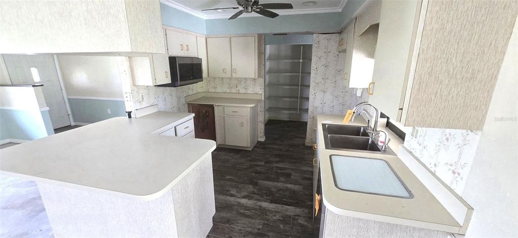Photo of 12197 Cochran Avenue, Port Charlotte, FL 33981 (MLS # C7513934)