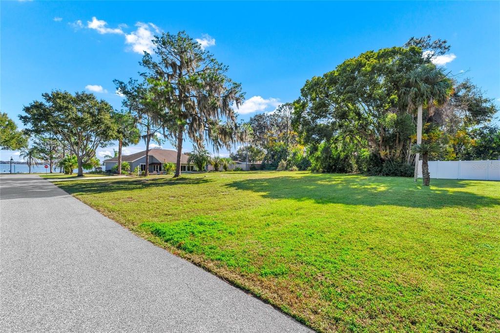 Photo of Xxxx E Holly Street, Howey In The Hills, FL 34737 (MLS # O6379413)