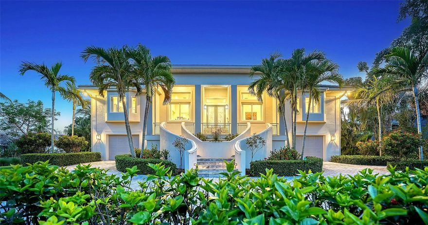 Located in an exclusive enclave of multi-million-dollar homes, this custom residence offers a special combination of privacy, prestige, and move-in-ready waterfront living. Ideal for boating and car enthusiasts, this residence was completely updated in 2018 and is set on a beautifully landscaped 0.6-acre lot. Cedar Park owners can enjoy private beach access to a pristine beach overlooking Big Pass and the Gulf. Inside, an open and thoughtfully designed single-story layout maximizes water views and natural light. Elegant tray ceilings, a stacked-stone gas fireplace, and plank tile floors set a refined tone throughout the main living spaces. Sliding glass doors in the living area seamlessly connect the interior to the expansive outdoor space, delivering a true Florida indoor-outdoor lifestyle. The gourmet kitchen is appointed with custom cabinetry, quartz surfaces, high-end stainless appliances, a handy dumb waiter, and two islands, flowing naturally into the casual dining area and family room. The formal living and dining spaces provide flexibility for both entertaining and everyday living. The spacious primary suite enjoys pool and water views, direct access to the covered terrace, a luxurious spa-style bath with freestanding tub, and a spacious walk-in closet. Three additional bedrooms, a private office, a large laundry/hobby room and a butler’s pantry complete the interior footprint, offering flexibility and privacy for guests and everyday living needs. One of the best features of this home is the huge garage – there is room for all your toys, 6-8 vehicles, storage, a climate-controlled game room, and a workshop! Designed for effortless entertaining, the expansive covered lanai features retractable screens, multiple lounging and dining areas, and overlooks the resort-like heated pool and spa framed with lush tropical landscaping. Neatly manicured, thick mangroves protect the property and provide a gateway to a large Trex dock with a 10,000-lb boat lift and 4,500-lb lift for two jet skis. The calm, protected waters of Cocoanut Bayou offer quick access to the open waters of Sarasota Bay and the Gulf. Homeowners have access to 100 feet of private beachfront with a gated entry, tiki hut, a dog run, parking, and a set of multi-colored Adirondack chairs from which to enjoy the spectacular sunset skies. Additional features of the home include hurricane-impact windows and doors, central vac, circular brick driveway, a side parking pad, huge garage with workshop and game room fitted with Endura flood easy maintenance wall system, a pre-wired elevator shaft, and an outdoor shower. Block construction and built to hurricane code standards, this residence offers peace of mind and modern convenience. Located on the north end of the island, just 1.4 miles from Siesta Key Village and moments from downtown Sarasota - 244 Cedar Park Circle delivers a unique blend of privacy, boating lifestyle, and coastal elegance.