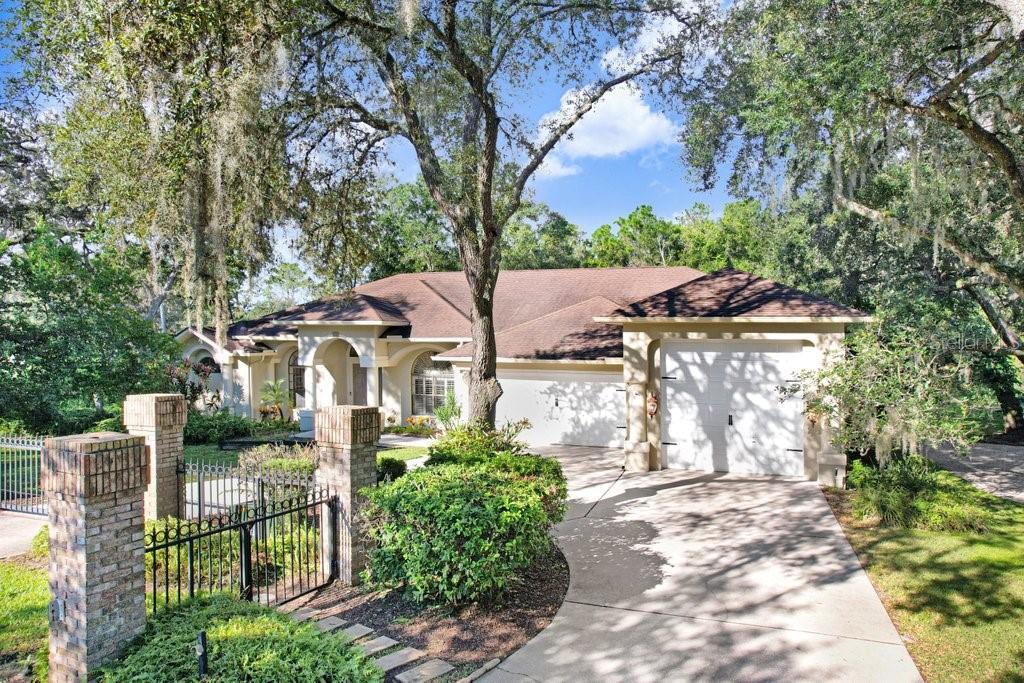 Photo of 8705 Crescent Forest Boulevard, New Port Richey, FL 34654 (MLS # TB8558565)