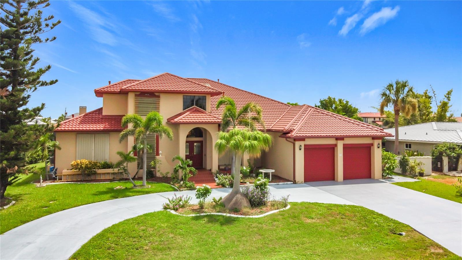 Spacious Waterfront Home on a Cul-de-Sac – Just around the corner from the Port Charlotte Beach Complex! Nestled on the scenic Anstead Waterway with IMMEDIATE DEEP WATER SAILBOAT ACCESS to Charlotte Harbor and the Gulf of Mexico, this beautiful two-story home offers the perfect blend of comfort, elegance, and functionality. Inside, you’ll find a formal living and dining room adorned with sparkling crystal chandeliers, along with a generous great room featuring vaulted ceilings and a cozy fireplace. French doors open to a fully tiled Florida Room that overlooks the peaceful backyard and canal—a perfect spot to relax or entertain. The kitchen is well-appointed with stainless steel appliances, a breakfast bar, and ample cabinet space. The spacious first-floor master suite includes French door access to the Florida Room, a large walk-in closet, a storage closet, and a luxurious en-suite bathroom with a jetted tub and separate shower. Also on the main level is a second bedroom, a full bath, and a large storage closet. Upstairs, you'll find two additional bedrooms and another full bathroom, providing plenty of room for family or guests. Storage is abundant throughout this unique home. Additional features include a freshly painted garage floor, circular driveway, and an accessible ramp into the home. Located close to shopping, dining, medical facilities, and the sandy beaches of Southwest Florida. Easy access to I-75, US-41, Punta Gorda Airport, and Southwest Florida International Airport make this an ideal location for both full-time residents and seasonal visitors.