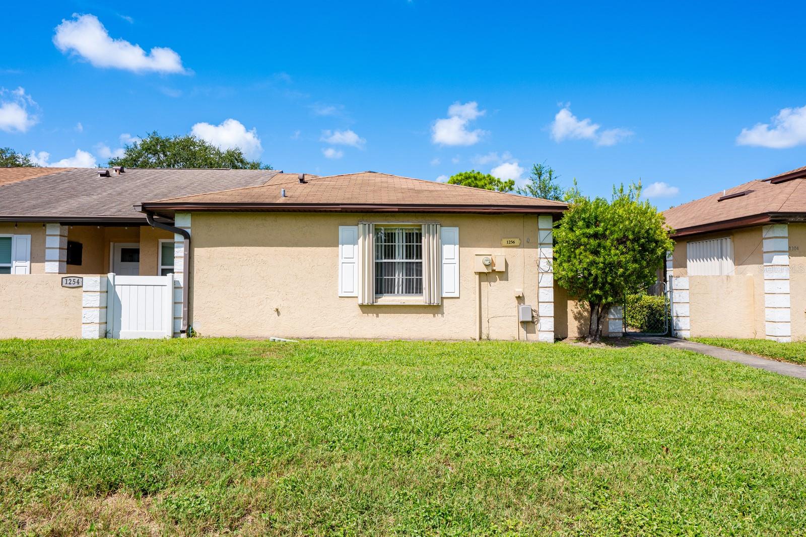**Seller may consider buyer concessions if made in an offer**Welcome to this 2-bedroom, 2-bath single-story townhouse in Sussex Place, a GREAT OPPORTUNITY for investors or buyers looking to add their personal touch. While the home is in need of a little TLC, it offers solid bones and several VALUABLE UPDATES, including a NEW HVAC SYSTEM (2024) and hurricane shutters for peace of mind. Inside, enjoy the LOW-MAINTENANCE appeal of ceramic tile flooring that extends through every room, and a floor plan offering plenty of potential to reimagine the Living, Dining, and Kitchen spaces to suit your style. The Primary Bedroom features an EN SUITE BATH and walk-in closet, while a second Bedroom and full bath provide flexibility for guests, roommates, or a home office. Enjoy the benefit of a LOW HOA and a location just steps from the COMMUNITY POOL. Its proximity to the UNIVERSITY OF CENTRAL FLORIDA, VALENCIA COLLEGE, and WATERFORD LAKES TOWN CENTER makes this townhome especially attractive for use as a rental or student housing. You’ll also find EASY ACCESS to SR 417, SR 408, and East Colonial Drive, putting Downtown Orlando, the airport, and area employers within quick reach. Whether you’re looking for a rental investment, a flip project, or a primary residence you can renovate to your taste, this Sussex Place townhome is FULL OF OPPORTUNITY and ready for its next chapter. Schedule a showing today!