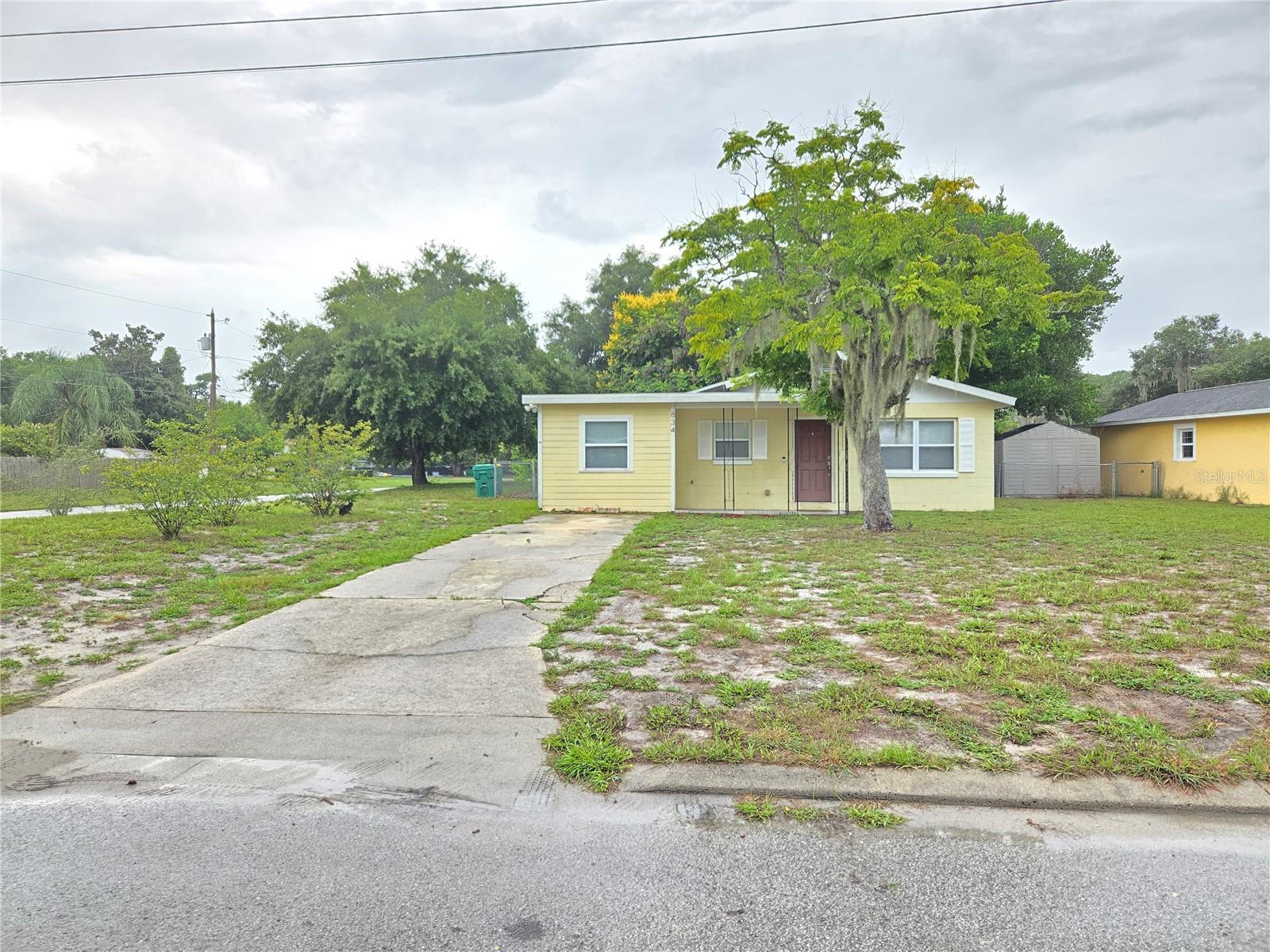 Non-HOA Community. The property is located in an Amazing Quarter-of-an-acre Corner lot: upgrades: Roof 2020, AC 2022, Dishwasher 2022, open floor plan with a spacious Kitchen with access to the Laundry room and Pantry. You may see the fireworks on days like
the 4th of July from your home. A 10 to 15-minute walk to Lake Eustis and Eustis Downtown. The City of Eustis introduced the new Downtown Waterfront Entertainment District in 2013, which brings together businesses for mutual promotion and activities, as well as family and friends to enjoy our unique shopping experience, fine dining, and live entertainment. If you like outdoor activities, the property is a few blocks from Lake Eustis. The Entertainment District is designed to create lots of fun with a variety of amenities for the public in a convenient physical location that promotes the downtown and City, fosters a mutual relationship among downtown merchants, and encourages private development of entertainment facilities that enhance and complement the use of the public facilities. The First Friday of each month is an event that provides family-friendly, community social events to promote the downtown businesses and showcase Historic Downtown Eustis.