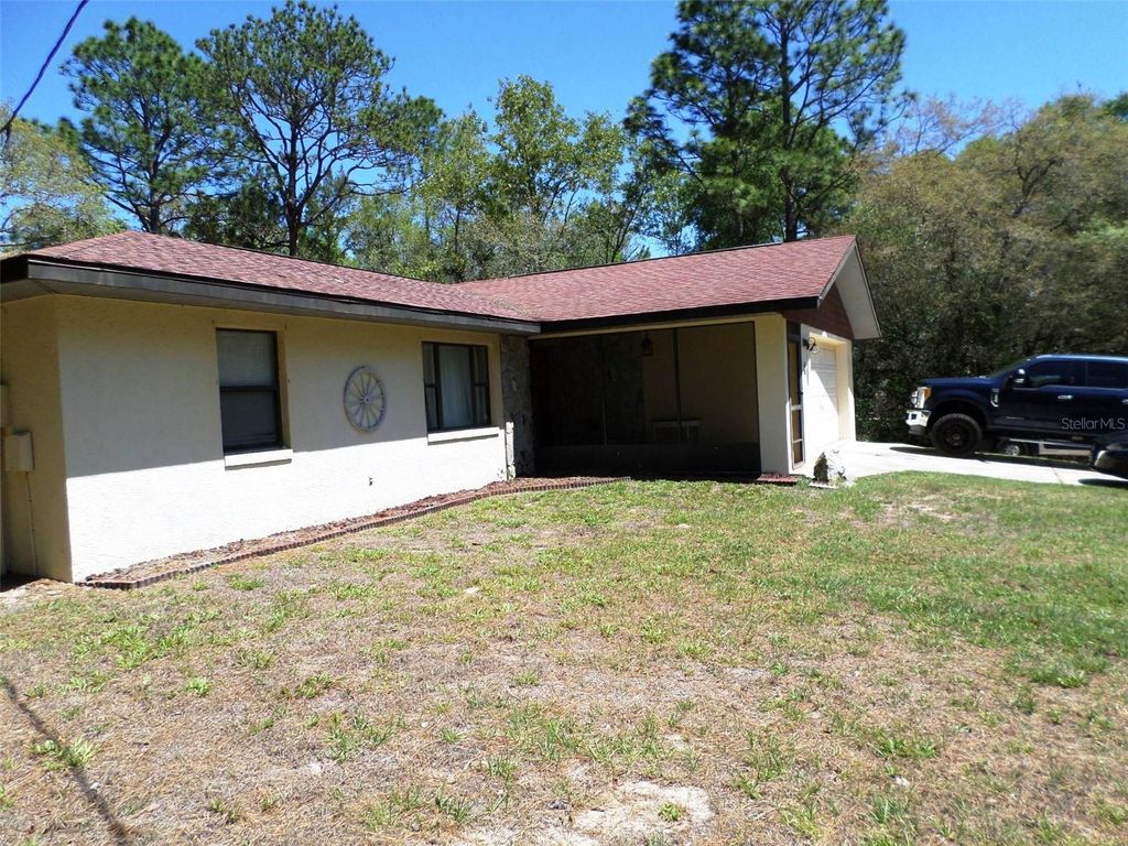 Photo of 1361 W Saint Elizabeth Place, Citrus Springs, FL 34434 (MLS # OM722761)