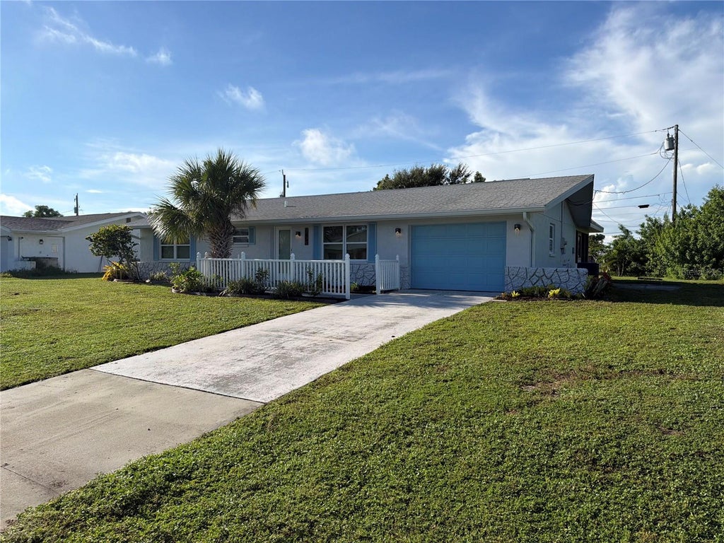 Photo of 145 Dartmouth Drive NW, Port Charlotte, FL 33952 (MLS # O6439938)