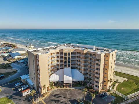 Photo of 421 S Atlantic Avenue #409, New Smyrna Beach, FL 32169 (MLS # NS1089027)