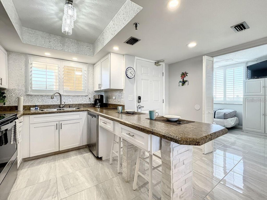 Photo of 421 S Atlantic Avenue #409, New Smyrna Beach, FL 32169 (MLS # NS1089027)
