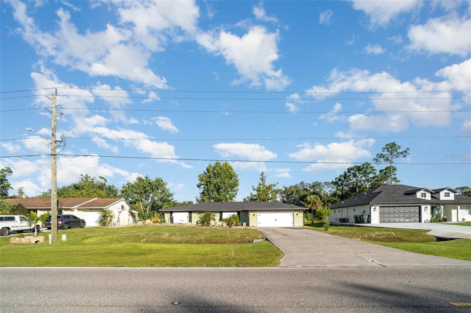 This 3-bedroom, 2-bathroom home is move-in ready and priced to sell—opportunities like this don’t come often! Step inside to soaring cathedral ceilings, brand new hardwood flooring, and fresh carpet for a warm and welcoming feel. The custom-tiled kitchen counters add character, while the split-bedroom layout provides comfort and privacy.
Enjoy Florida living at its best with a screened-in patio overlooking your backyard, plus the convenience of a 2-car garage. Thoughtful upgrades include a new AC (2022), water heater (2020), and no flood insurance required! Even better—this home is located in a non-HOA neighborhood, giving you freedom and flexibility.
Just minutes from local favorites like the North Port Aquatic Center, Warm Mineral Springs, and Blue Ridge Park, you’ll have endless opportunities for relaxation, recreation, and family fun.