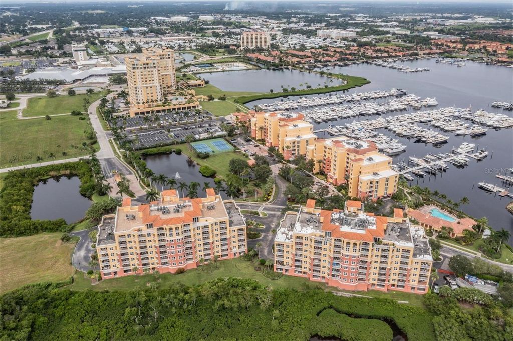 Photo of 615 Riviera Dunes Way #402, Palmetto, FL 34221 (MLS # TB8427423)