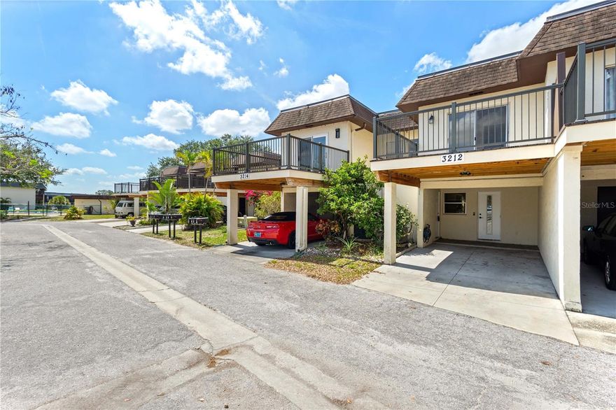 Welcome to Ramblewood Acres – A Spacious 3-Bedroom Condo in a Gated Sarasota Community! Discover the perfect blend of comfort, convenience, and style in this spacious 3-bedroom, 2.5-bathroom condo located in the highly sought-after gated community of Ramblewood Acres. Pull right up to your front door under the covered carport, where you'll also find a private attached laundry room—a practical touch right as you enter. Step inside to a freshly painted kitchen with a smooth satin finish, a convenient half bath, and an open-concept living and dining area that flows effortlessly to your screened-in back patio, perfect for your morning coffee. Upstairs, you'll find a primary suite with an ensuite bathroom and its own private balcony, ideal for enjoying Florida’s breezy evenings. Two additional guest bedrooms and a second full bathroom provide plenty of space for family or visitors. One of the guest rooms opens directly onto a brand-new, expansive deck above the carport—a unique space perfect for entertaining or unwinding under the stars. Recent upgrades include new laminate wood flooring throughout both floors, stunning new lighting, new electrical outlets and switches in most rooms, new toilets in all bathrooms, and a brand-new water heater for added peace of mind.Enjoy resort-style living with access to three community pools, tennis courts, a playground, and a clubhouse for social events and gatherings. Located in the vibrant heart of Sarasota, this condo offers unbeatable accessibility. You're just minutes from the world-renowned Siesta Key Beach, St. Armand's Circle, Lido Beach, Sarasota-Bradenton International Airport, I-75, the UTC Mall, and a variety of shopping and dining options. Whether you’re seeking a primary residence or a vacation home this beautifully updated condo at Ramblewood Acres has it all.