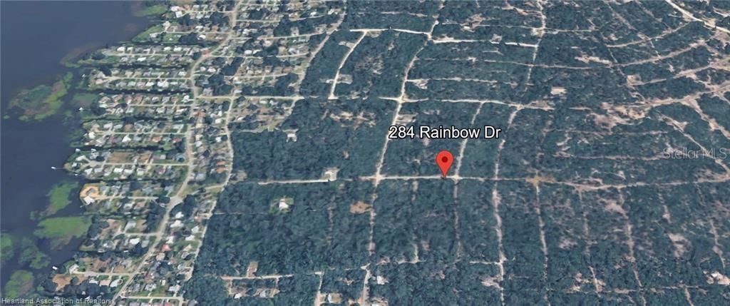 Photo of 284 Rainbow Drive, Lake Placid, FL 33852 (MLS # L4961925)