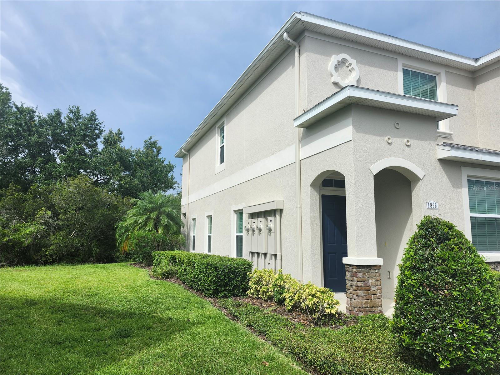 This move-in ready townhome home boasts 2 spacious bedrooms/2.5 bathrooms ( with a downstairs bonus room that can be used as a bedroom or office) , laminate flooring and tile floors , 9-foot ceilings, new washer/dryer/refrigerator, updated HVAC/water heater/interior paint, granite countertops in the kitchen and a great open plan with large breakfast area, and lots of room for living and dining. Master bedroom includes en-suite bath with two walk-in closets. The second bedroom also provides an en-suite bath with walk-in closet, while the first-floor bonus room has access to a separate full bath. The spacious living room and kitchen open to glass sliding doors which lead to the landscaped back yard with a view of a green conservation area. The upstairs laundry room is conveniently located near the master suite. This home is an end unit with plenty of windows which provide ample sunlight, and the community pool is only steps away from this desirable unit. Walden Woods is a gated community perfectly located close to shopping, restaurants, and entertainment. Schedule your tour of this fabulous property today!