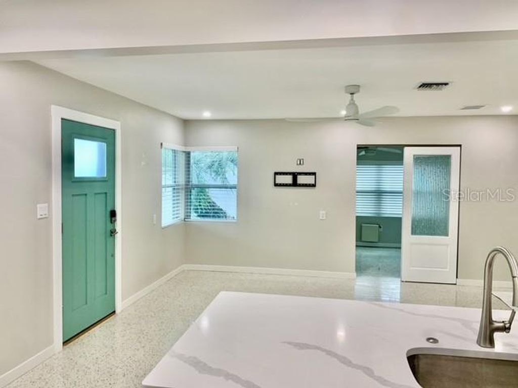 Photo of 2472 Coronado Way, Dunedin, FL 34698 (MLS # TB8496776)