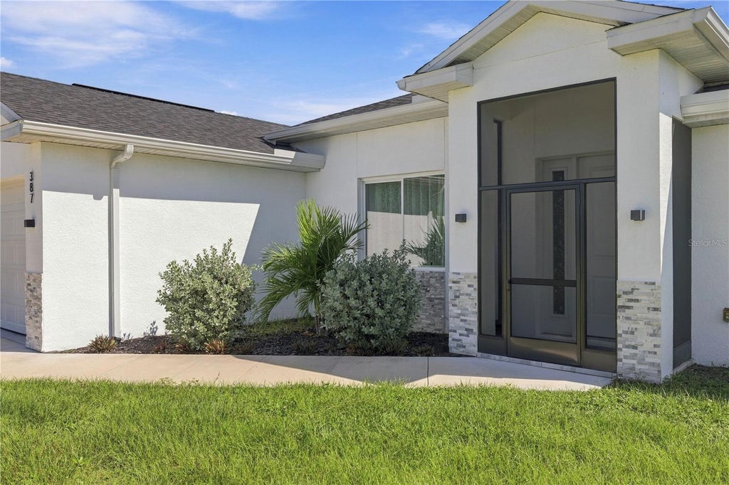 Photo of 387 Venetia Avenue, North Port, FL 34287 (MLS # A4709461)