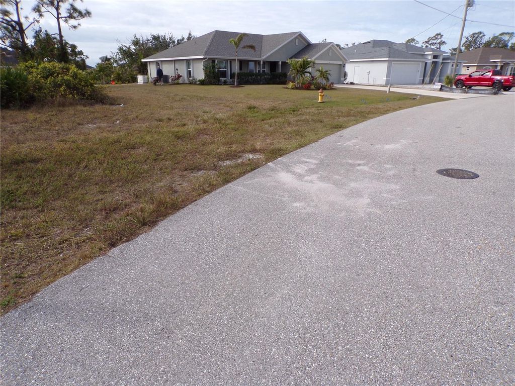 Photo of 22 Medalist Terrace, Rotonda West, FL 33947 (MLS # C7503519)