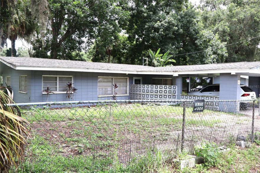 Home with Bonus Room on Oversized Lot, with detached garage that has bathroom, and sleeping quarters.

This 2-bedroom, 1-bath home offers comfort, flexibility, and room to grow. A large bonus room—currently used as a third bedroom—adds versatile living space perfect for guests, an office, or a hobby room. The expansive lot includes a detached garage and a separate workshop with small living quarters attached—ideal for rental income, a home business, or multi-generational living. The detached garage also includes a generously sized concrete slab that extends from the building—perfect for potentially extending workshop, additional outdoor seating, parking, or even a future outdoor kitchen setup. Come update the bathroom the way that you would want it! The kitchen has been updated with nice tall custom wood cabinets and leads out to a screened back porch; a perfect spot for sipping on your coffee or ice cold beverage.
Stepping outside- situated on an oversized lot, this charming property features a completely fenced yard adorned with mature tropical plants, palm trees, and majestic oak that shades a cozy fire pit—perfect for relaxing evenings under the stars. Cool off in the above-ground pool or gather with friends in this spacious yard for ultimate outdoor enjoyment. 

Located just minutes from multiple boat ramps, you’ll enjoy easy access to Lake Panasoffkee—famous for some of the best fishing in Florida. From the lake, travel down the scenic Withlacoochee River, known for viewing native wildlife in their natural habitat and seeing the beauty of old Florida.

Embrace small-town charm with the added convenience of being only minutes from The Villages, where you'll find free nightly entertainment, world-class golf, shopping, dining, and more. You’re also just a short drive to Florida’s beautiful west coast, offering waterfront dining, pristine beaches, kayaking adventures, fishing spots, and refreshing natural springs for unforgettable weekend getaways.

With quick access to I-75 and the Florida Turnpike, travel to Orlando’s theme parks and major airports is seamless. This home is the perfect blend of comfort, privacy, and access to the best of Florida living.

 Equal Housing Opportunity