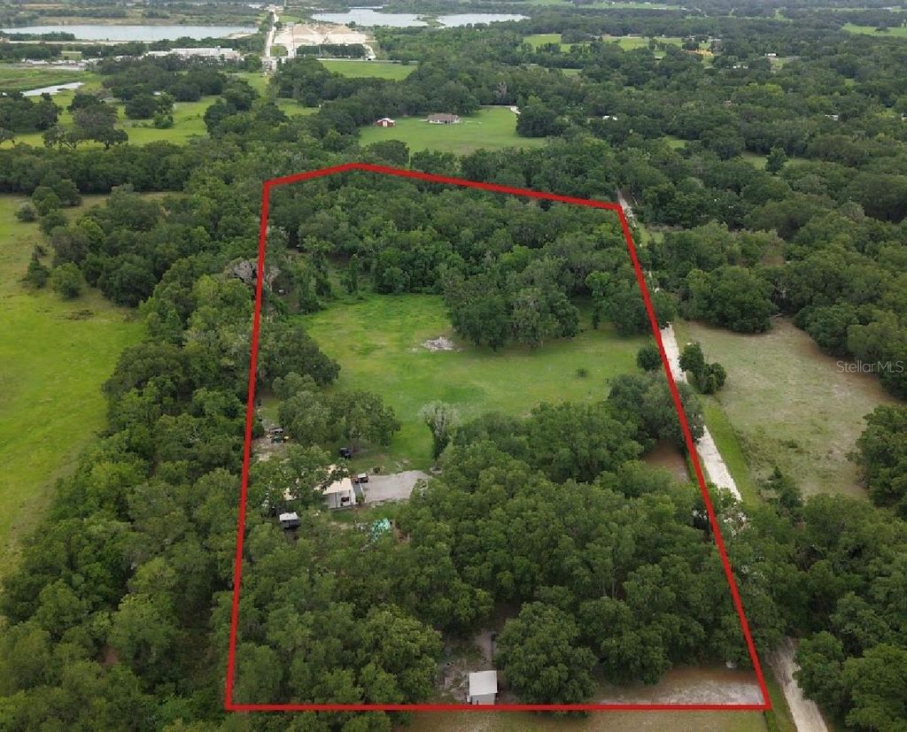 Photo of 528 Ashley Ln, Center Hill, FL 33514 (MLS # O6413674)