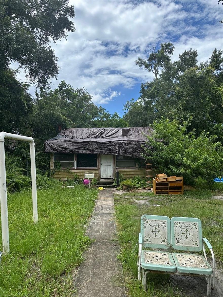 House is being marketed as a teardown at land value. Lot is 50x162', located in NT-1 zoning and did not receive flood damage during last year's storms. Neighboring lot is in flood zone X500. Potential to build new and up above flood zone. The long lot leaves room for an ADU in the back of the property.