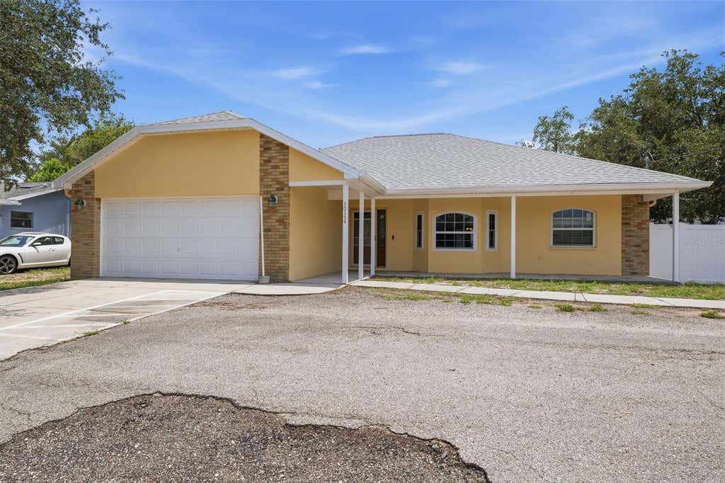 Photo of 10154 Spring Hill Drive, Spring Hill, FL 34608 (MLS # W7886406)