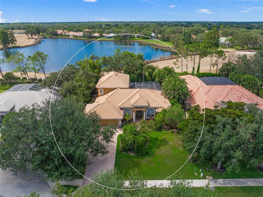 This is the one * QUALITY BUILT BY PRUETT HOMES AND LOCATED BEHIND THE GATES OF THE RARELY AVAILABLE HAMMOCKS NEIGHBORHOOD, WHERE YOUR DREAM HOME AWAITS * 'A' RATED SCHOOL DISTRICT * Lovingly cared for, and the PRIDE OF OWNERSHIP SHOWS * This FAMILY ESTATE HOME is LOCATED ON A PREMIUM CUL DE SAC * 1/3 ACRE LOT IS A MUST-SEE PRIVATE SETTING * NO THROUGH TRAFFIC * This BEAUTIFUL home backs to VIEWS of Laurel Oak Golf Course and a lovely Lake * NO NEIGHBORS BEHIND YOU * This IMMACULATE 2 Story Home is a MUST-SEE * This Split Plan Design boasts a total of 5 Bedrooms PLUS Office/Den & 3 Baths * 2nd Floor features 2 Guest Bedrooms, 1 Bath & a 27x19 Bonus Room for entertaining and is perfect for kids or guests. DOWNSTAIRS: Primary Suite, 2 Guest Bedrooms, Den, Formal Living Room & Formal Dining Room with Gas Fireplace * Private Master Suite is LARGE with a HUGE Oasis Bath, Dual Sinks, Soaking Tub & a Separate Walk-in Shower * Gorgeous Chef's Kitchen opens to the Family Room with VIEWS to the Private, Heated Pool & Spa * This DREAM KITCHEN showcases a Pantry, Breakfast Bar, Nook/Dinette with Aquarium Glass, Wood Cabinets, Granite Counters, Gas Cook-top & Double Oven * Excellent home to entertain in or just relax in your slice of paradise * 3 car Garage allows for plenty of room for all the toys * Paver Brick Driveway * The Hammocks is a 24 hour gated community with low annual HOA fees * It has that country feel yet you are minutes to Siesta Key Beach, excellent schools, shopping & dining * Rothenbach Park & Publix Plaza are nearby * All the luxury features you desire are here! * One look & you'll fall in Love *