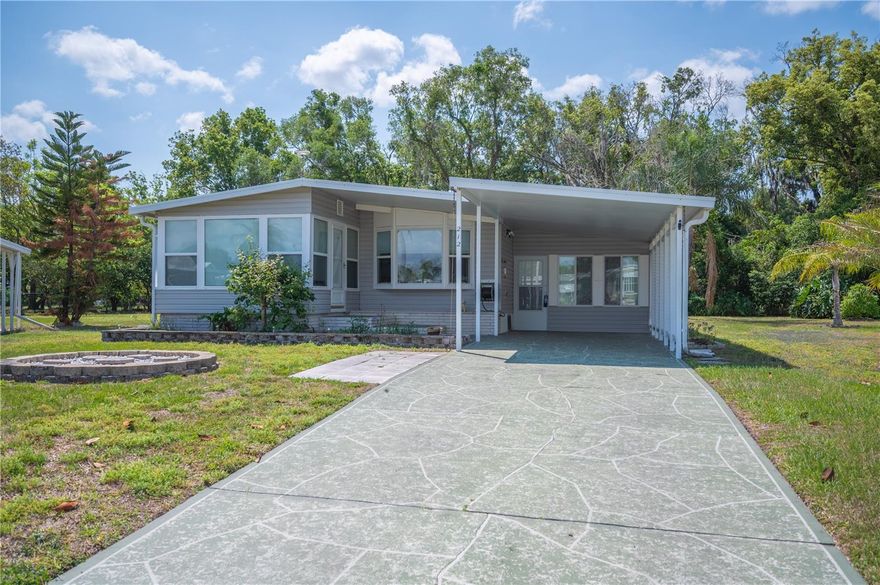 Looking for an affordable home where you own your own land? This 2 bedroom, 2 bath home comes FURNISHED and sits on a large lot along the exterior of the community! This home features a large Florida room, updated kitchen, enclosed sun room, and a very functional layout. Citrus Woods Estates is one of Lakeland’s most affordable 55+ communities, with HOA fees of just $710/year. Enjoy a heated pool, shuffleboard, clubhouse, library, and plenty of community activities plus nighttime security through the sheriff’s office. Schedule your showing today!