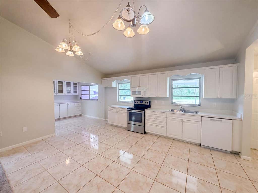 Photo of 1870 N Seminole Road, Avon Park, FL 33825 (MLS # O6431237)