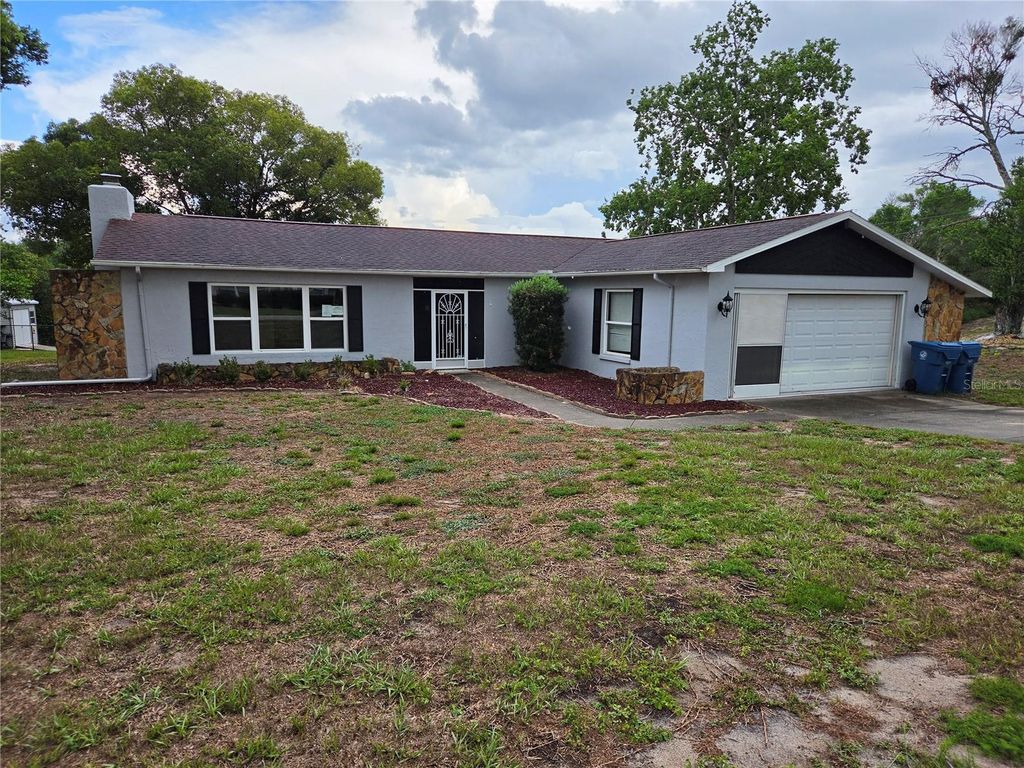 Photo of 10200 Sunburst Court, Spring Hill, FL 34608 (MLS # TB8525334)