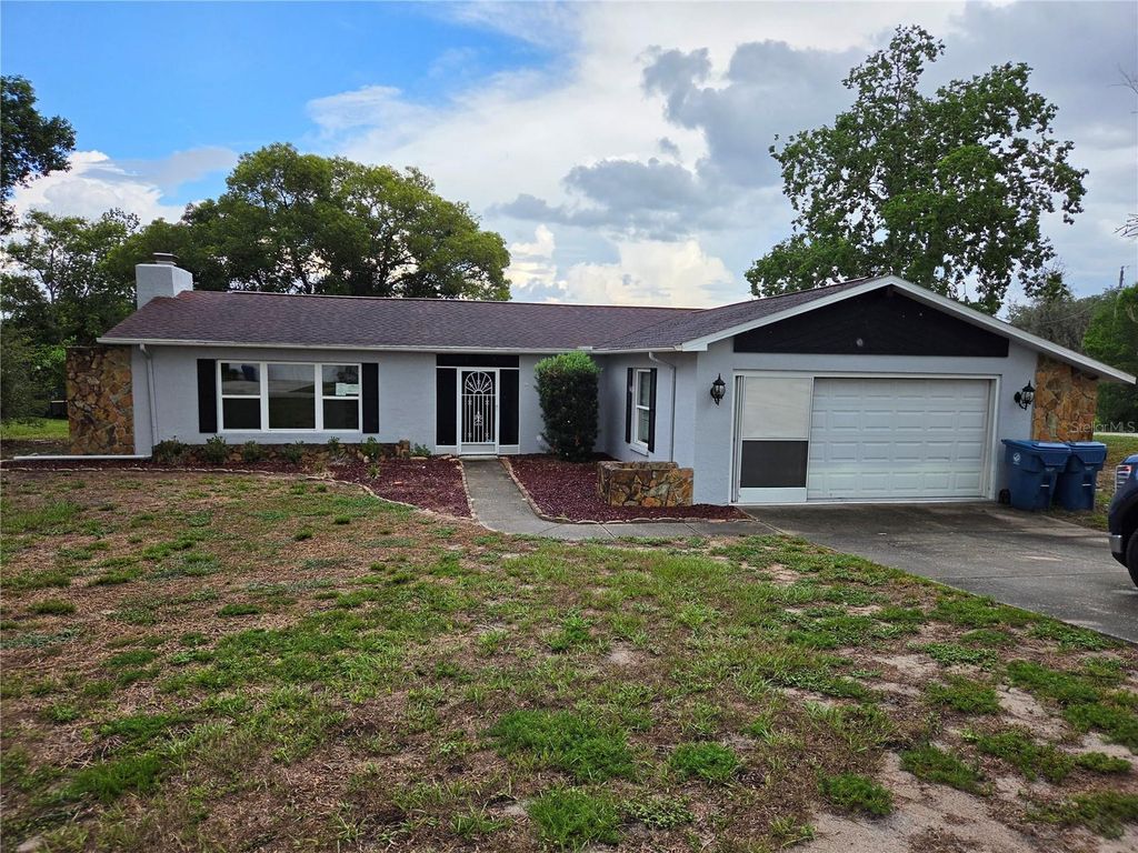 Photo of 10200 Sunburst Court, Spring Hill, FL 34608 (MLS # TB8525334)