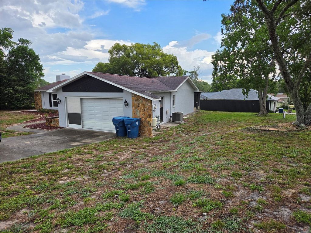 Photo of 10200 Sunburst Court, Spring Hill, FL 34608 (MLS # TB8525334)