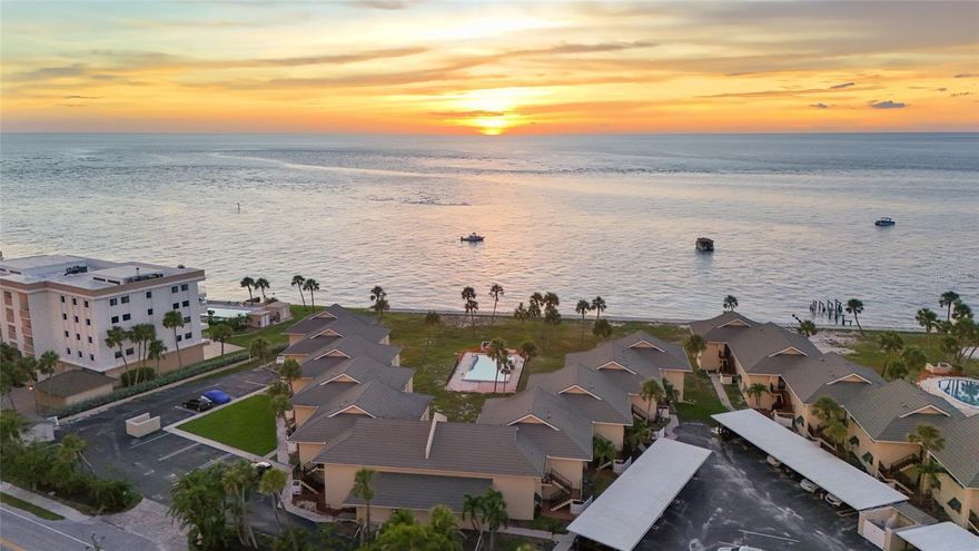 Experience million-dollar, direct Gulf views from this ground floor condominium in the sought after community of Sea Village on Siesta Key. Enjoy sunsets every evening from your private lanai, just steps from the shoreline and minutes from one of the world’s top beaches. This 2-bedroom, 2-bath residence has been thoughtfully updated with a fully remodeled kitchen, tile flooring throughout, and plantation shutters. Hurricane-impact windows provide peace of mind and lasting value. Additional features and upgrades include a 2021 water heater, 2022 HVAC, 2023 electrical panel, in-unit washer and dryer, designated parking, storage shed, and bike storage. Sea Village offers residents a true coastal lifestyle with a heated waterfront pool, tropical grounds, and easy access to dining, shopping, and Siesta Key’s vibrant village. Covered parking and generous guest parking make entertaining convenient. Perfect as a primary residence or seasonal retreat, this home blends unmatched views with modern upgrades in one of Sarasota’s most desirable island communities.