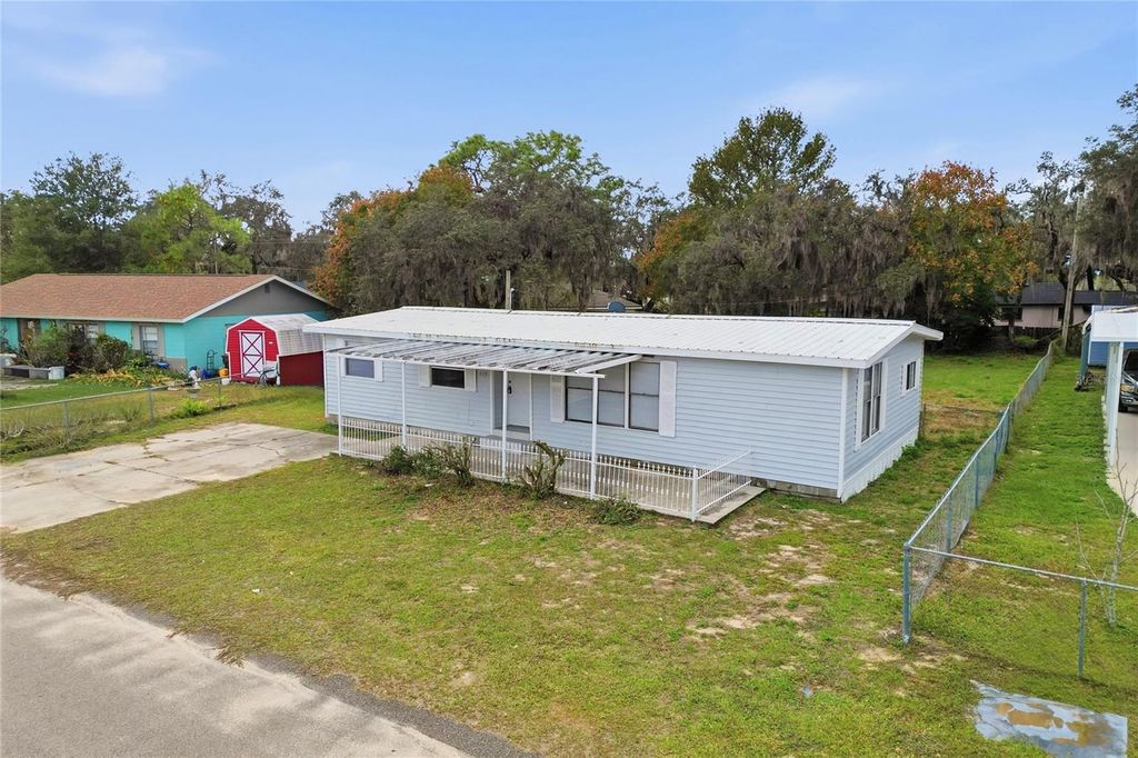 Photo of 419 Sunrise Boulevard, Polk City, FL 33868 (MLS # L4957822)