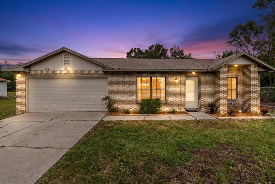 RARE HALF ACRE Homesite just steps from Dewey Boster Sports Complex Park and less than 15 minutes from the Amazon Fulfillment Center! This split plan 3 Bedroom 2 Bath home gives you endless opportunities with this oversized property! Build your dream garage or workshop, storage for all your toys or your business vehicles.... OR.... Split the lot and potentially build another house! Not to mention, this is a 1 OWNER meticulously maintained home complete with a brick facade that you just don't see too many of. Truly a hidden gem in Deltona and all for under $300,000! With tons of updates throughout, it's as move in ready as you could ask for: Vaulted Ceilings, updated bathrooms, lighting and fans, flooring, brand new sliding glass door, newer fridge, stove, dishwasher and water heater. There's even a small walking trail through the backyard offering some peace, quiet and privacy all around. Don't miss out on this hard to come by opportunity and get your offer in today!