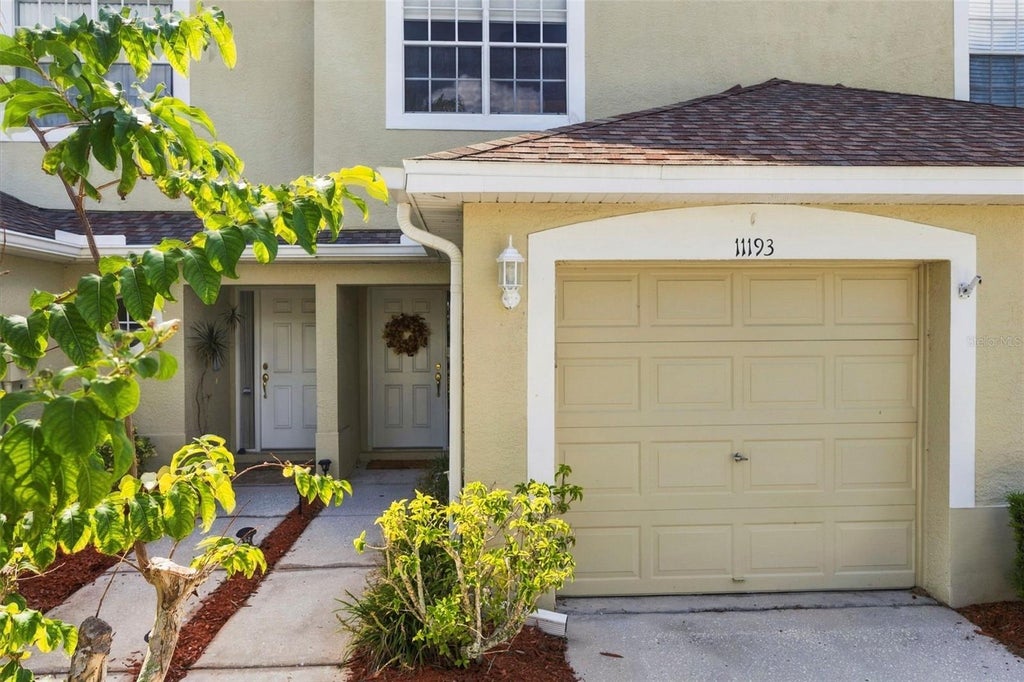 Photo of 11193 Kapok Grand Circle, Madeira Beach, FL 33708 (MLS # TB8552477)