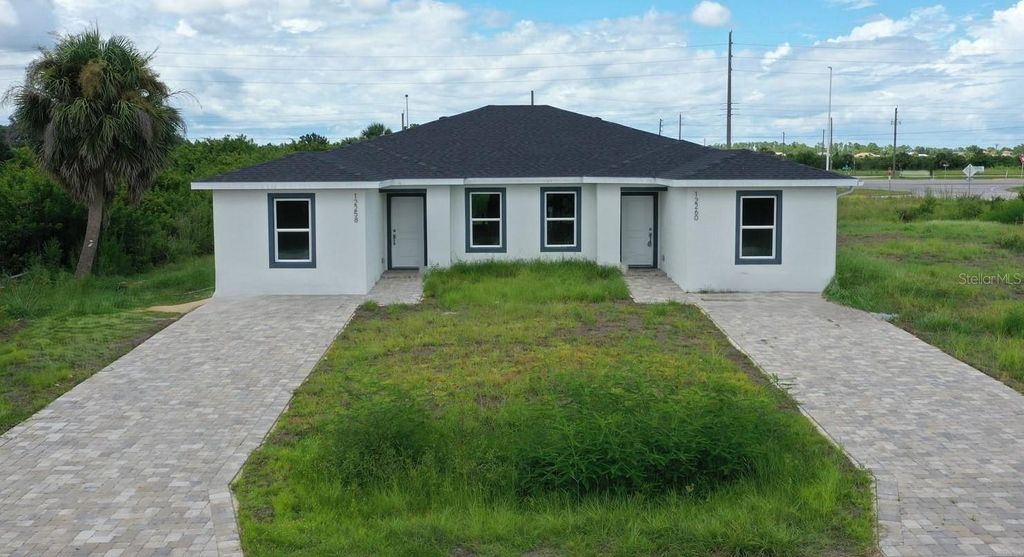 Photo of 12258 Henley Avenue #A&amp;B, Port Charlotte, FL 33981 (MLS # C7514299)