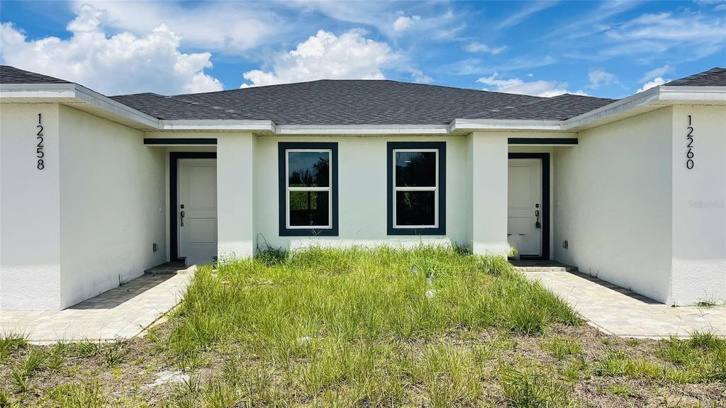 Photo of 12258 Henley Avenue #A&amp;B, Port Charlotte, FL 33981 (MLS # C7514299)