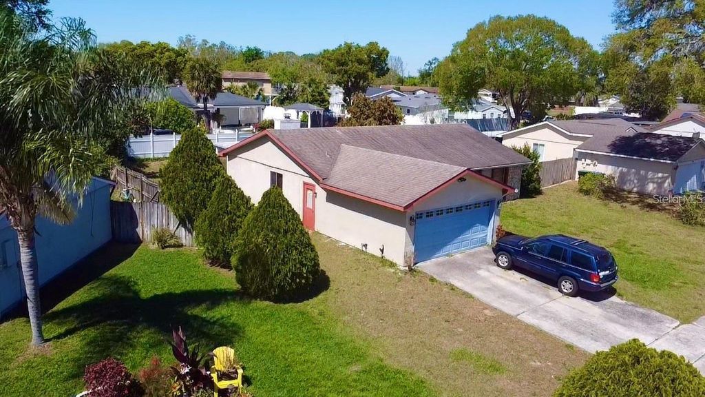 Photo of 7717 Pineapple Drive, Orlando, FL 32835 (MLS # O6342793)