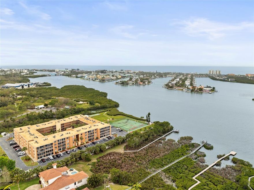 This 2/2 Condo is located in a intracoastal Waterway Community with direct access to the Gulf. 3rd Floor unit with elevator. No Flooding or Hurricane Damage during the storms. The Community is gated and approximately 5 minutes from Indian Rocks Beach. This unit has been updated with new laminate flooring, New stove, New dishwasher, Paint, New Trane A/C (2021) and a New Hot water heater (2022), New roof (2022).  New carpet in bedrooms (2025).  It has a Maytag washer and dryer in the unit. There is a relaxing Hot tub a few steps from the front door. Two sparkling pools, shuffleboard court, tennis courts, pickleball, huge clubhouse and a fitness center. It has kayak racks on the property and a nice landing to launch. Picnic tables, and a private gated access to Bonner Park. It has a pool table and organized activities for everyone. Several propane grills throughout the property for grilling. Several great restaurants and stores nearby. The location is unbeatable. Definitely a must see.