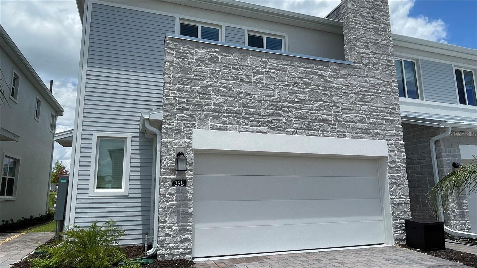 Beautiful new contemporary townhouse featuring 3 bedrooms, 2.5 bathrooms in Champions Pointe community. Open-concept floor plan with modern kitchen includes granite countertops and stainless-steel appliances, connecting seamlessly to the dining and living areas.
Upstairs, all bedrooms are located together, including the spacious owner’s suite with a walk-in closet and dual-sink vanity. The home also offers a two-car garage and a private backyard with no rear neighbors, perfect for outdoor gatherings and barbecues.
The community offers resort-style amenities including a clubhouse with pool, playground, walking trails, and a scenic lake. Conveniently located near US-27 and I-4, this property is close to Walt Disney World Resort, Posner Park, Disney Springs, top golf courses including Champions Gate, and zoned for excellent schools (Westside K-8 and Celebration High School). Internet and ground care included
Easy to show—schedule your appointment today!
