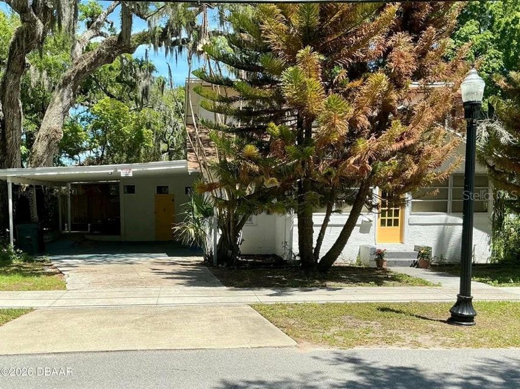 Photo of 711 S Palmetto Avenue, Daytona Beach, FL 32114 (MLS # V4948687)